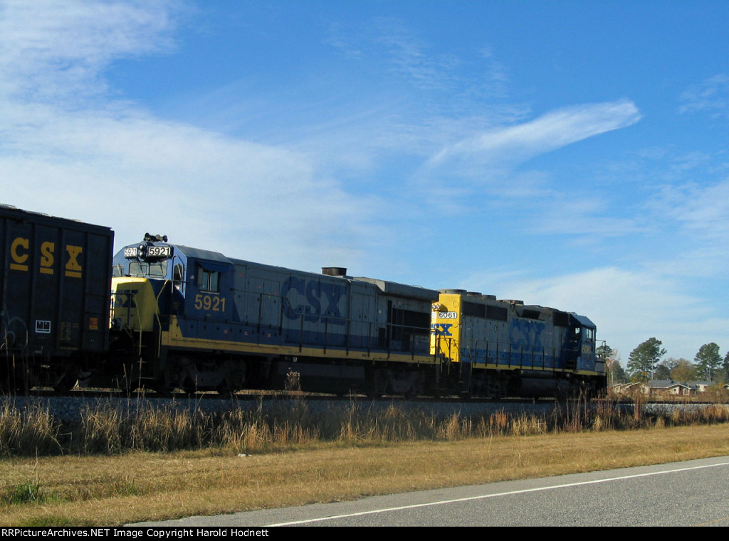 CSX 6061 & 5921 wait to cross the diamonds